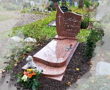 Grafsteen met grote bronzen roos